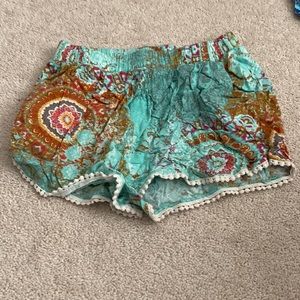 multicolor shorts with white fringe